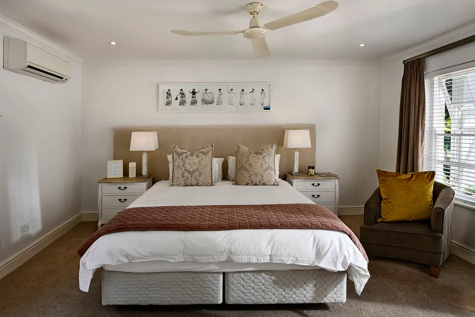 Hotel bedroom with a large bed and natural light